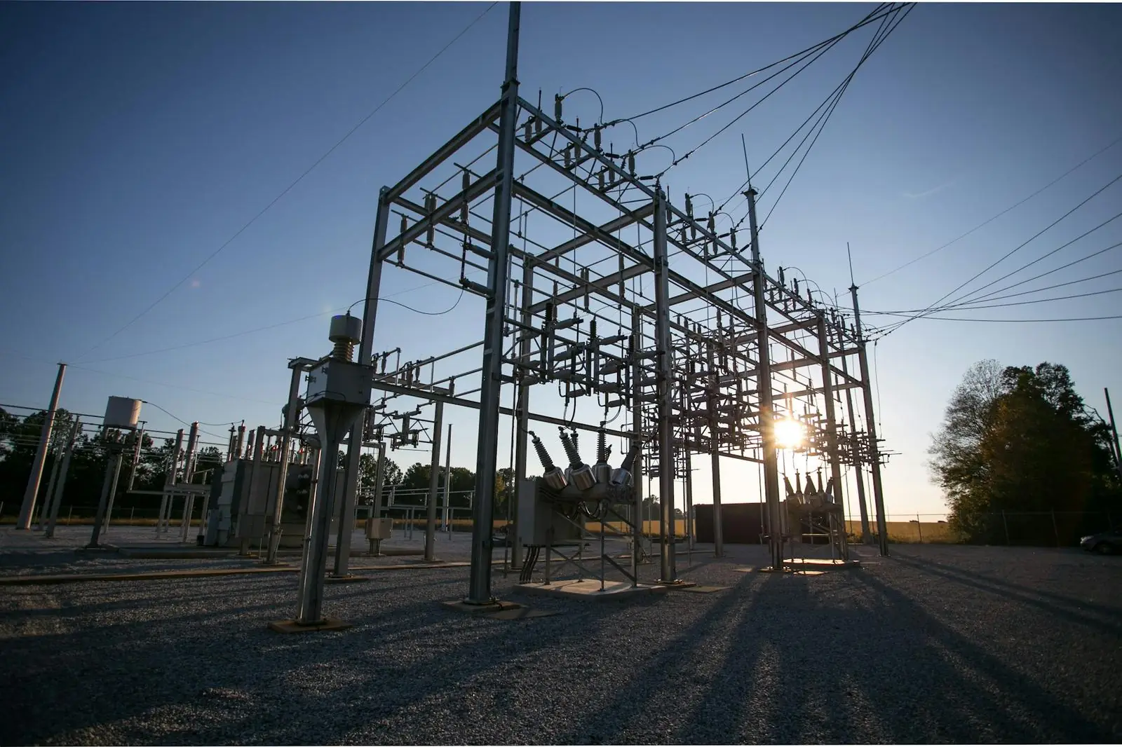 Steel structures at a substation at dusk